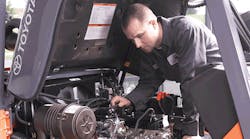 A Prolift associate at Toyota Material Handling U.S.A., Inc. services a lift truck.