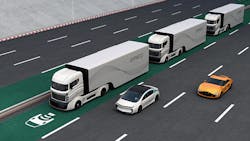 A platoon of autonomous hybrid trucks driving on a wireless charging lane A platoon of autonomous hybrid trucks driving on a wireless charging lane