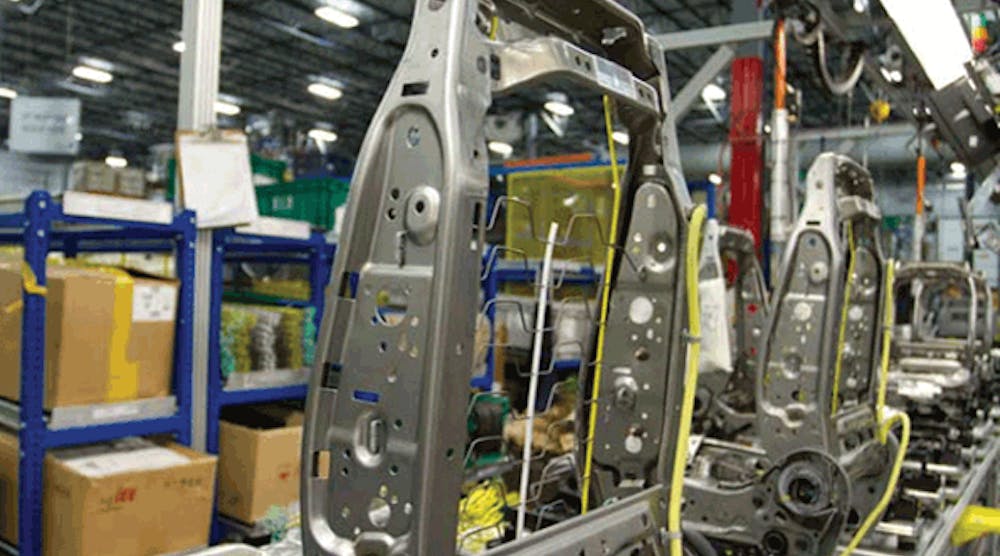 Sub-assembly of car seats using carton flow at a Toyotetsu plant.