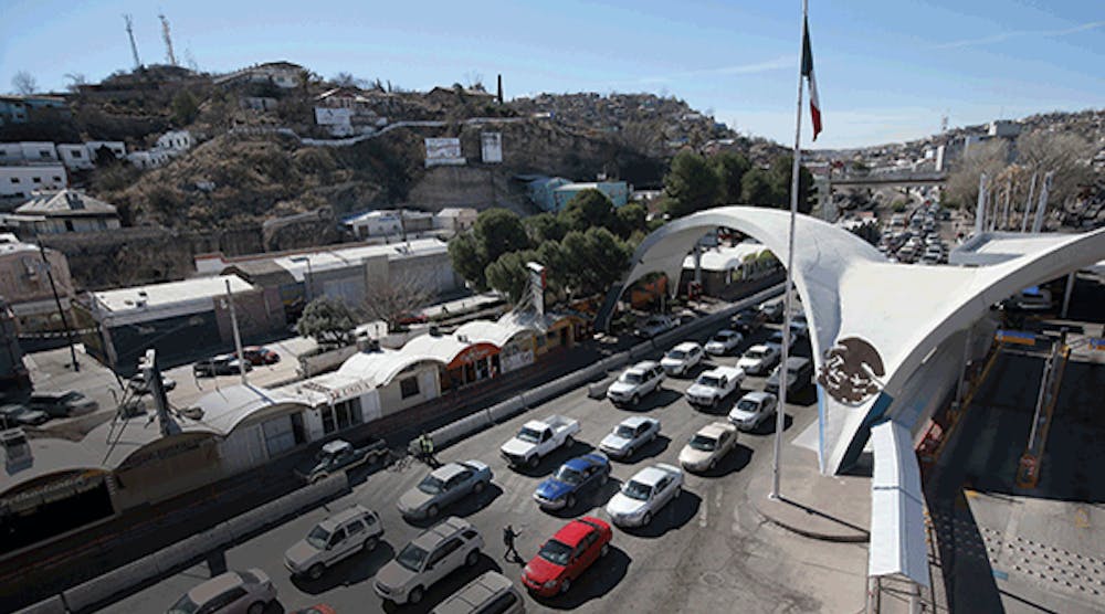 Traffic from Mexico waits to cross into the United States in Nogales, Arizona, the state&apos;s busiest border crossing. (Photo by John Moore/Getty Images)