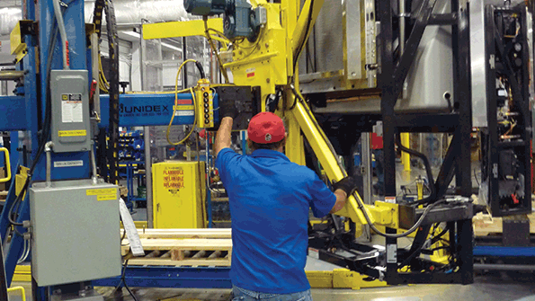 Trailer units at Carrier Transicold are rotated to their upright position to complete the manufacturing process Electronic controls and safety devices are in place to assist the operator for an efficient and safe transfer of the unit