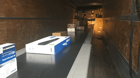 Telescopic conveyors extend the powered conveying surface inside a trailer bringing the product into the trailer at the location where it is to be loaded