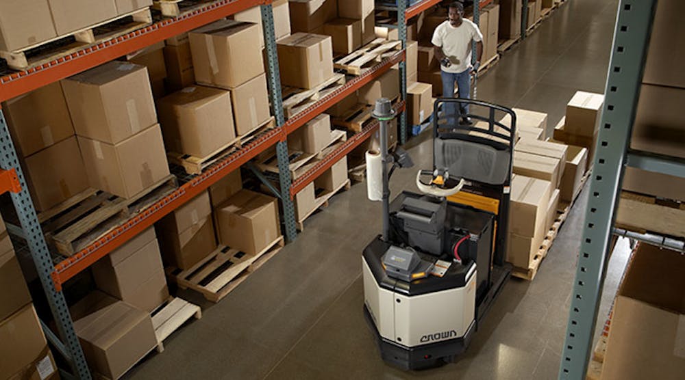 A remote order picking technology utilizes a special glove that remotely controls the movement of the pallet truck. (Photo provided by Crown Equipment Corp.)