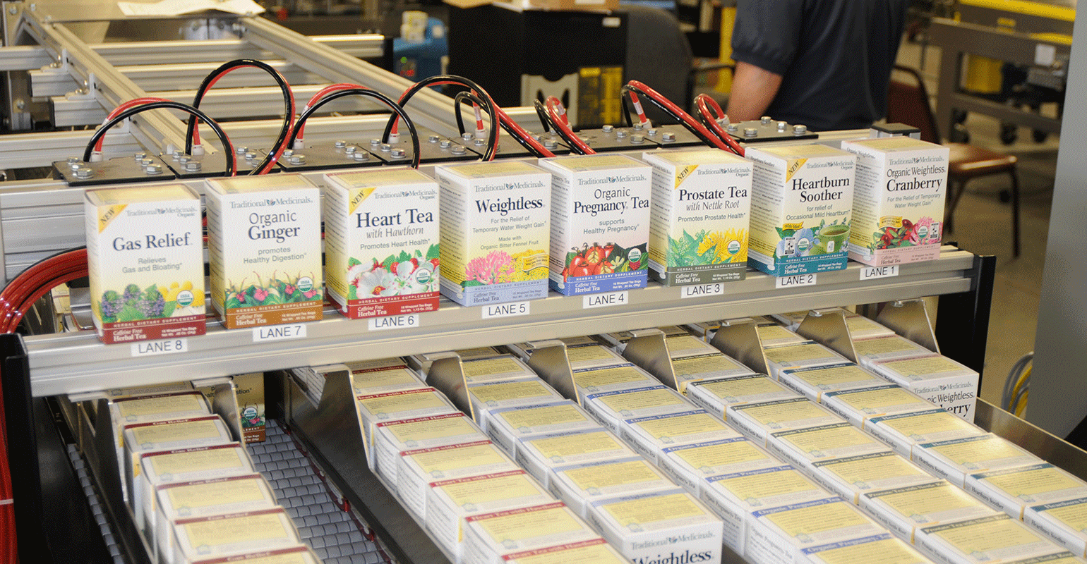 Tea cartons on conveyor