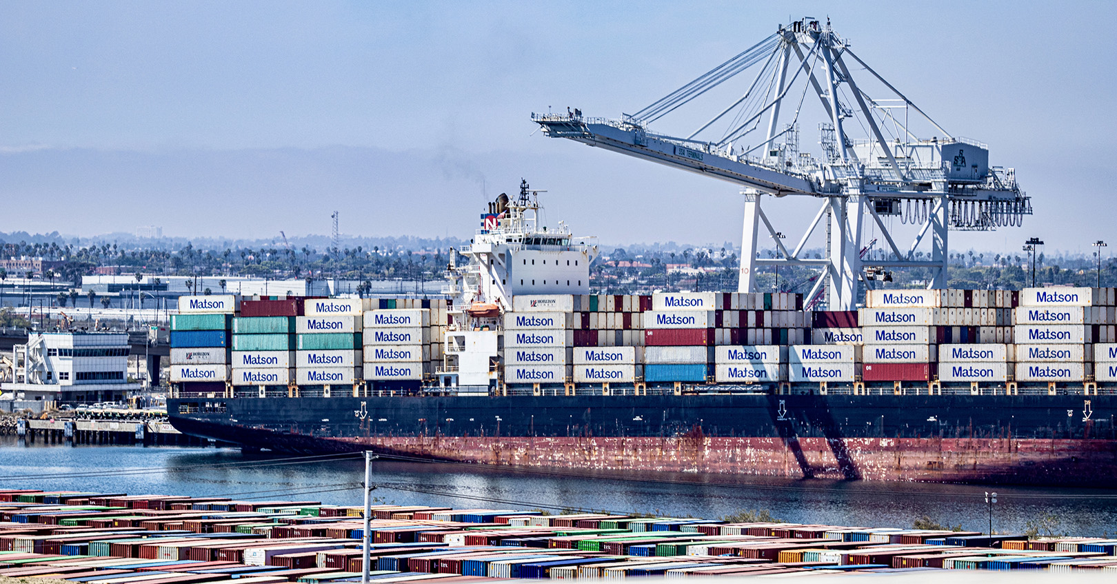 Large cargo ship with shipping containers in the Port of Los Angeles in Long Beach, Calif.