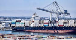Large cargo ship with shipping containers in the Port of Los Angeles in Long Beach, Calif. Large cargo ship with shipping containers in the Port of Los Angeles in Long Beach, Calif.
