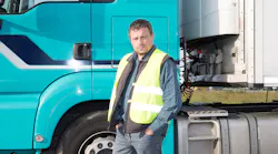Truck Driver Next To Truck