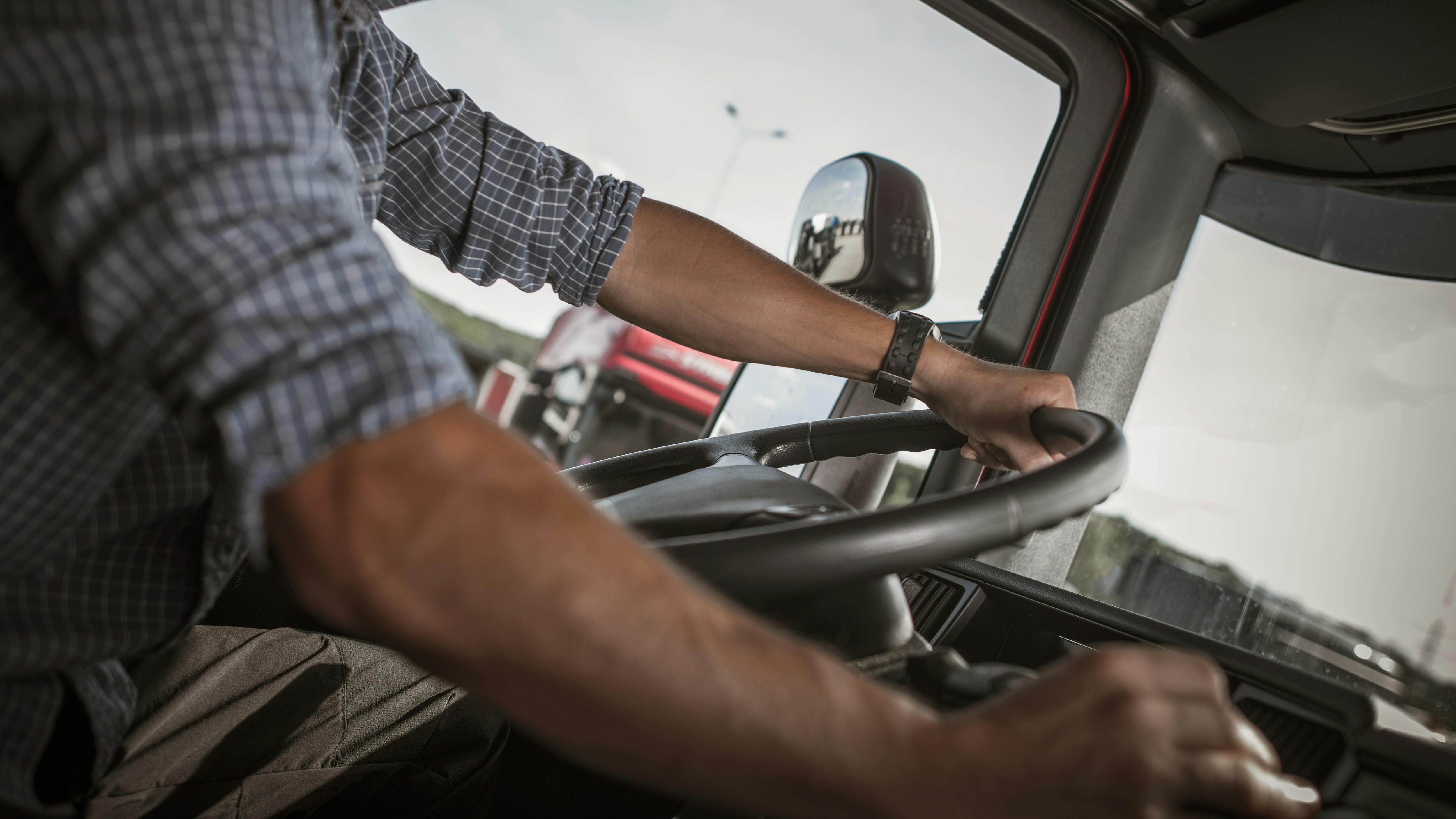 661eda105be402001eaaba0e Trucker Behind Wheel